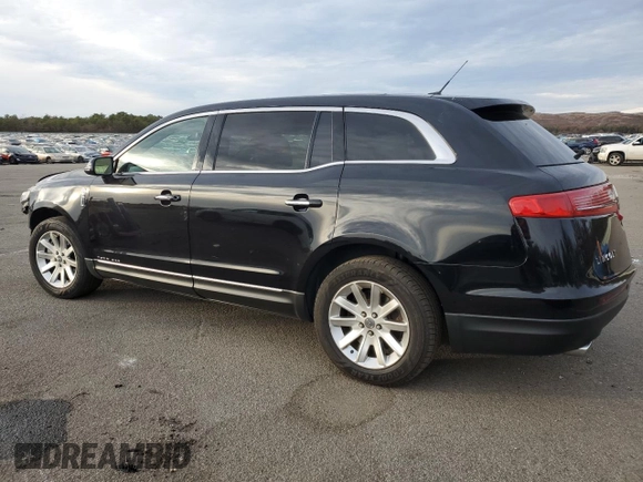 2019 Lincoln MKT with VIN 2LMHJ5NKXKBL02985, listed as a Copart auction lot 80615654 with 112,112 mi miles and Salvage Title. Bid and sale history available at DreamBid. Image 2.