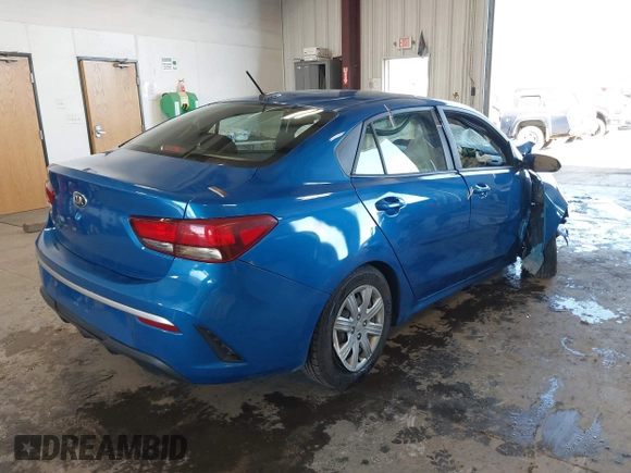 2021 Kia Rio S with VIN 3KPA24AD7ME364789, listed as a IAAI auction lot 42044676 with 54,072 mi miles and . Bid and sale history available at DreamBid. Image 4.