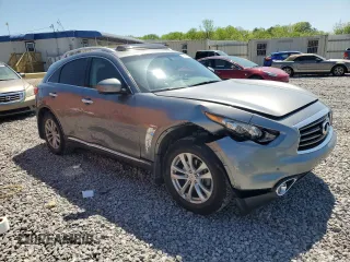 2014 Infiniti QX70 with VIN JN8CS1MU1EM451534, listed as a Copart auction lot 52677335 with 118,862 mi miles and Salvage Title. Bid and sale history available at DreamBid. Image 4.