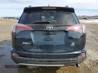 2018 Toyota RAV4 SE with VIN 2T3JFREV3JW806407, listed as a Copart auction lot 48980005 with 70,165 mi miles and Salvage title. Bid and sale history available at DreamBid. Image 6.