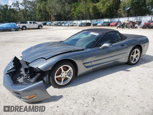 2004 Chevrolet Corvette with VIN 1G1YY32G945124387, listed as a Copart auction lot 77113234 with 59,985 mi miles and Salvage Title. Bid and sale history available at carsss.com. Image 1.