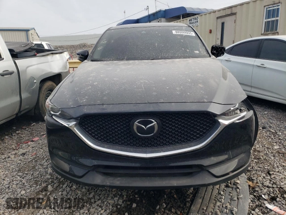 2021 Mazda CX-5 Sport with VIN JM3KFABM1M0418660, listed as a Copart auction lot 88999955 with 0 mi miles and Salvage Title. Bid and sale history available at carsss.com. Image 5.