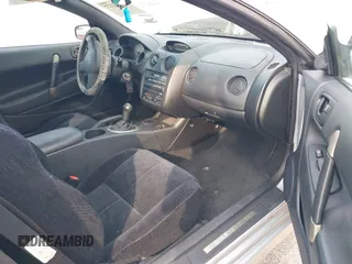 2000 Mitsubishi Eclipse GT z VIN 4A3AC84L5YE103909, wystawiony jako IAAI lot #42425327 z przebiegiem 112 940 mil mil oraz . Historia ofert i sprzedaży dostępna na DreamBid. Obrazek 5.