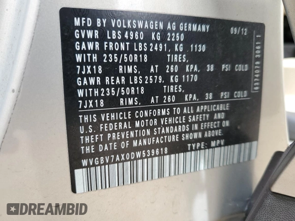 2013 Volkswagen Tiguan SE z VIN WVGBV7AX0DW539618, wystawiony jako Copart lot #71529804 z przebiegiem 148 362 mil mil oraz Szkoda całkowita • Salvage title. Historia ofert i sprzedaży dostępna na DreamBid. Obrazek 14.