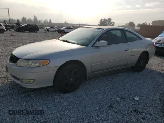 2002 Toyota Solara SE z VIN 2T1CF22P52C596572, wystawiony jako Copart lot #86617654 z przebiegiem 115 438 mil mil oraz Czysty tytuł • Clean title. Historia ofert i sprzedaży dostępna na DreamBid. Obrazek 1.