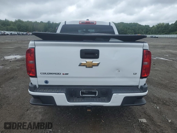 2018 Chevrolet Colorado 2WD LT with VIN 1GCGSCENXJ1264210, listed as a Copart auction lot 61026535 with 133,000 mi miles and Salvage title. Bid and sale history available at DreamBid. Image 6.