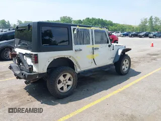 2015 Jeep Wrangler Unlimited Rubicon z VIN 1C4BJWFGXFL755810, wystawiony jako IAAI lot #42495531 z przebiegiem 109 668 mil mil oraz . Historia ofert i sprzedaży dostępna na DreamBid. Obrazek 4.