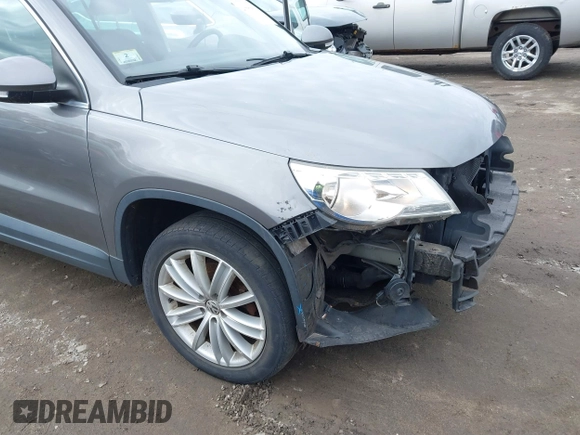 2011 Volkswagen Tiguan SE with VIN WVGBV7AX4BW532524, listed as a IAAI auction lot 41757552 with 141,115 mi miles and . Bid and sale history available at DreamBid. Image 13.
