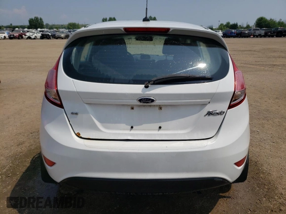 2015 Ford Fiesta SE z VIN 3FADP4EJ7FM169000, wystawiony jako Copart lot #64402674 z przebiegiem 191 221 mil mil oraz Szkoda całkowita • Salvage title. Historia ofert i sprzedaży dostępna na DreamBid. Obrazek 6.