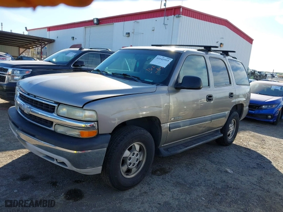 2003 Chevrolet Tahoe LS with VIN 1GNEC13V13J163837, listed as a IAAI auction lot 41641915 with 102,312 mi miles. Bid and sale history available at carsss.com. Image 2.