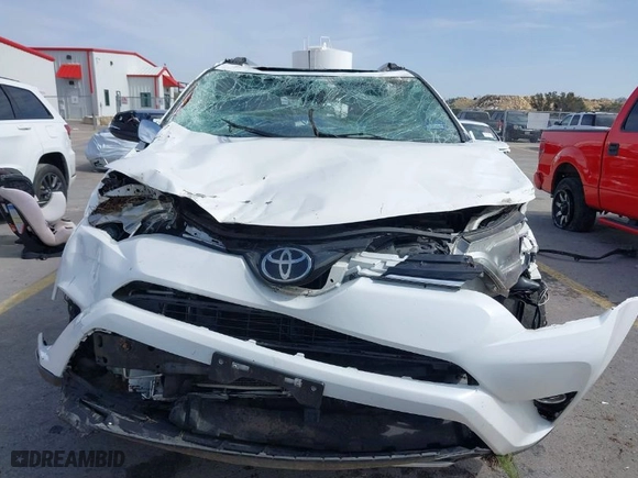 2018 Toyota RAV4 XLE with VIN JTMWFREV0JD132042, listed as a IAAI auction lot 41578567 with 102,365 mi miles. Bid and sale history available at carsss.com. Image 6.