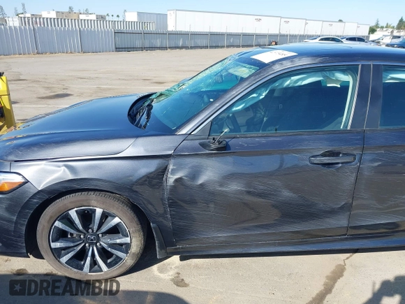 2024 Honda Civic EX z VIN 2HGFE1F76RH332735, wystawiony jako IAAI lot #42373485 z przebiegiem 13 946 mil mil oraz . Historia ofert i sprzedaży dostępna na DreamBid. Obrazek 14.