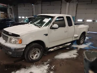 2000 Ford F-150 z VIN 2FTRX08W6YCA09298, wystawiony jako IAAI lot #41391038 z przebiegiem 179 738 mil mil oraz . Historia ofert i sprzedaży dostępna na DreamBid. Obrazek 2.