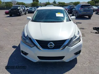 2016 Nissan Altima SV with VIN 1N4AL3AP9GC135114, listed as a IAAI auction lot 41851507 with 127,033 mi miles and . Bid and sale history available at DreamBid. Image 13.