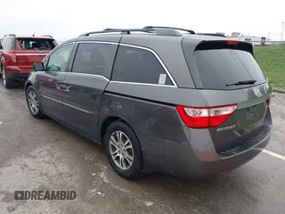 2012 Honda Odyssey EX-L with VIN 5FNRL5H6XCB032366, listed as a IAAI auction lot 41943625 with 73,236 mi miles and . Bid and sale history available at carsss.com. Image 3.