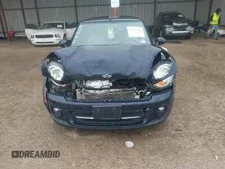 2013 MINI Convertible with VIN WMWZN3C53DT135492, listed as a IAAI auction lot 41436703 with 79,408 mi miles and . Bid and sale history available at DreamBid. Image 12.