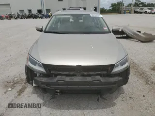 2014 Volkswagen Jetta SE with VIN 3VWD07AJ6EM209228, listed as a Copart auction lot 60500525 with 118,261 mi miles and Salvage title. Bid and sale history available at DreamBid. Image 5.