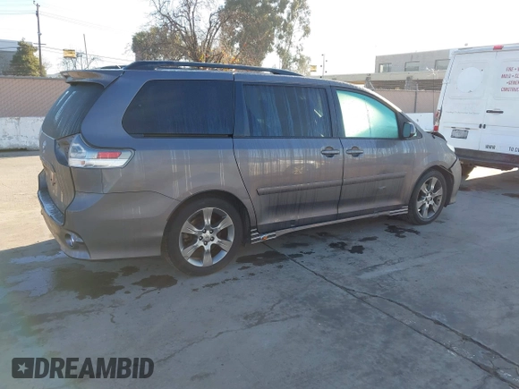 2011 Toyota Sienna SE with VIN 5TDXK3DC5BS064260, listed as a IAAI auction lot 41616160 with 98,505 mi miles. Bid and sale history available at carsss.com. Image 4.