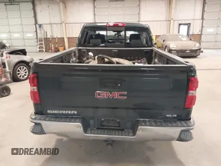 2017 GMC Sierra 1500 SLE z VIN 1GTV2MEC2HZ194077, wystawiony jako IAAI lot #41509400 z przebiegiem Nie podano mil oraz . Historia ofert i sprzedaży dostępna na DreamBid. Obrazek 16.