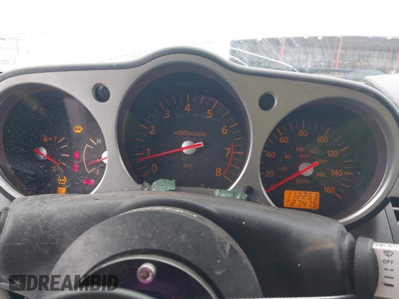 2003 Nissan 350Z Touring z VIN JN1AZ34E43T014247, wystawiony jako IAAI lot #42120812 z przebiegiem 112 263 mil mil oraz . Historia ofert i sprzedaży dostępna na DreamBid. Obrazek 7.