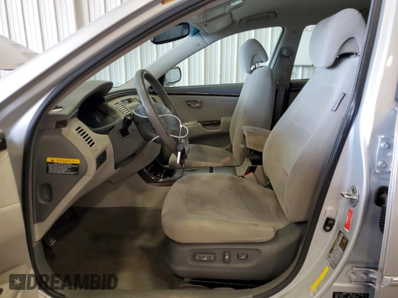 2010 Hyundai Azera GLS with VIN KMHFC4DD7AA473519, listed as a Copart auction lot 71422234 with 120,080 mi miles and Salvage title. Bid and sale history available at DreamBid. Image 7.