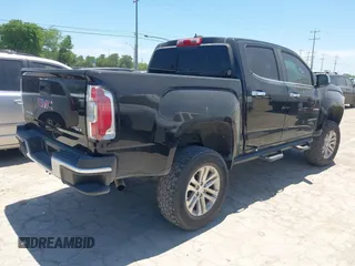 2017 GMC Canyon 2WD SLT z VIN 1GTG5DEN0H1215315, wystawiony jako IAAI lot #42247267 z przebiegiem 132 509 mil mil oraz . Historia ofert i sprzedaży dostępna na DreamBid. Obrazek 4.