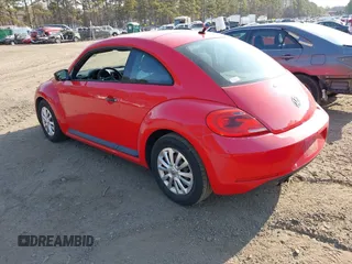 2012 Volkswagen Beetle Entry PZEV with VIN 3VWFP7AT8CM646053, listed as a IAAI auction lot 41700898 with 135,525 mi miles. Bid and sale history available at carsss.com. Image 3.