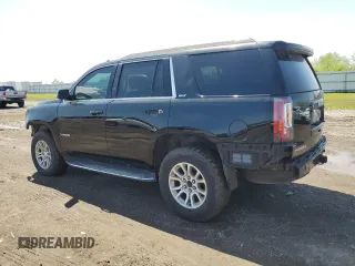 2016 GMC Yukon SLT with VIN 1GKS1BKC7GR432233, listed as a Copart auction lot 49619465 with 122,760 mi miles and Clean Title. Bid and sale history available at carsss.com. Image 2.