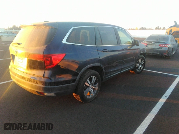 2016 Honda Pilot EX-L with VIN 5FNYF5H56GB052226, listed as a IAAI auction lot 39296292 with 33,056 mi miles and . Bid and sale history available at DreamBid. Image 4.