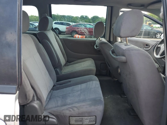 2005 Mazda MPV LX z VIN JM3LW28J650540407, wystawiony jako Copart lot #62223774 z przebiegiem 136 977 mil mil oraz Szkoda całkowita • Salvage title. Historia ofert i sprzedaży dostępna na DreamBid. Obrazek 11.
