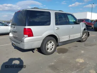 2003 Ford Expedition Special Service with VIN 1FMPU15L53LC50263, listed as a IAAI auction lot 41408415 with 124,891 mi miles. Bid and sale history available at carsss.com. Image 4.