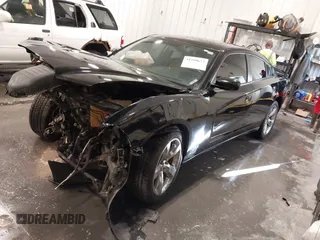 2012 Dodge Charger SXT with VIN 2C3CDXHG4CH142125, listed as a IAAI auction lot 41790623 with 110,252 mi miles. Bid and sale history available at carsss.com. Image 2.