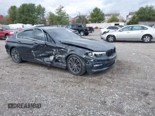 2018 BMW 5 Series 530i xDrive with VIN WBAJA7C53JWA71774, listed as a IAAI auction lot 40980216 with 96,699 mi miles. Bid and sale history available at carsss.com. Image 1.