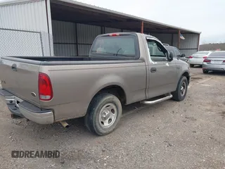 2002 Ford F-150 XL with VIN 3FTRF17212MA23970, listed as a IAAI auction lot 40991449 with 216,487 mi miles. Bid and sale history available at carsss.com. Image 4.