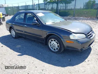 2000 Nissan Maxima GXE z VIN JN1CA31D6YT765482, wystawiony jako IAAI lot #42133010 z przebiegiem 192 005 mil mil oraz . Historia ofert i sprzedaży dostępna na DreamBid. Obrazek 1.