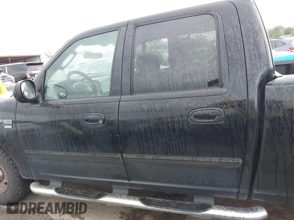 2003 Ford F-150 XLT with VIN 1FTRW07623KD67409, listed as a IAAI auction lot 41912067 with Not Provided miles. Bid and sale history available at carsss.com. Image 14.