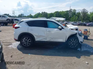 2018 Mazda CX-5 Grand Touring с VIN JM3KFBDM4J0414925, выставлен на аукционе IAAI как лот 42212109 с пробегом 86 826 миль миль и . История ставок и продаж доступна на DreamBid. Изображение 13.