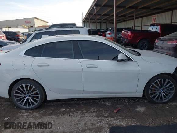 2021 BMW 2 Series 228i xDrive with VIN WBA73AK07M7H56978, listed as a IAAI auction lot 41215710 with 77,965 mi miles and . Bid and sale history available at DreamBid. Image 13.