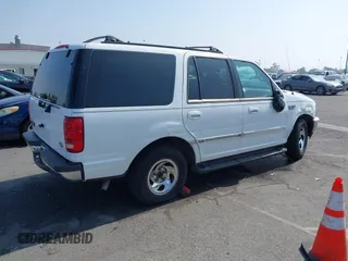 1998 Ford Expedition XLT with VIN 1FMRU176XWLA59524, listed as a IAAI auction lot 39809480 with 225,650 mi miles. Bid and sale history available at carsss.com. Image 4.