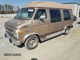 1995 Chevrolet Chevy Van z VIN 1GBEG25K9SF175004, wystawiony jako Copart lot #77952694 z przebiegiem 217 649 mil mil oraz Szkody całkowita. Historia ofert i sprzedaży dostępna na DreamBid. Obrazek 1.