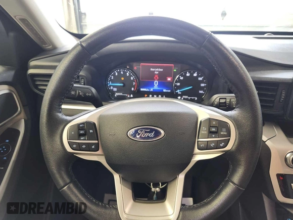 2021 Ford Explorer XLT with VIN 1FMSK8DH0MGA87649, listed as a IAAI auction lot 42141718 with 56,993 mi miles. Bid and sale history available at carsss.com. Image 1.