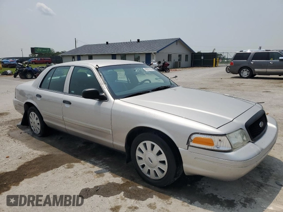2010 Ford Police Interceptor with VIN 2FABP7BV2AX126536, listed as a Copart auction lot 60327535 with 138,759 mi miles and Salvage title. Bid and sale history available at DreamBid. Image 4.