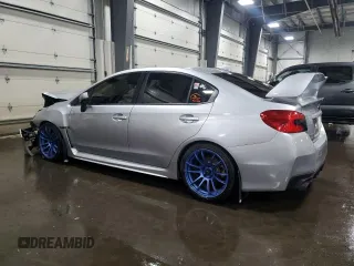 2016 Subaru WRX z VIN JF1VA1B67G9823319, wystawiony jako Copart lot #56790565 z przebiegiem 150 603 mil mil oraz Szkoda całkowita • Salvage title. Historia ofert i sprzedaży dostępna na DreamBid. Obrazek 2.