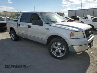 2005 Ford F-150 XLT with VIN 1FTRW12W35KC32505, listed as a Copart auction lot 54786525 with 149,614 mi miles and Salvage title. Bid and sale history available at DreamBid. Image 4.