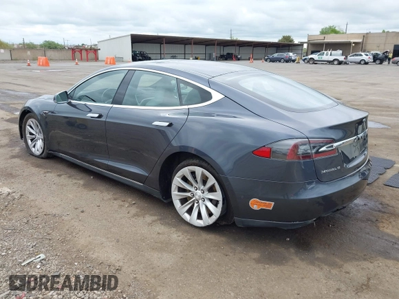 2016 Tesla Model S 90D with VIN 5YJSA1E27GF129824, listed as a IAAI auction lot 42058080 with 113,171 mi miles and . Bid and sale history available at DreamBid. Image 3.