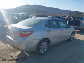 2016 Toyota Corolla L with VIN 5YFBURHE9GP566742, listed as a IAAI auction lot 41771845 with 130,601 mi miles. Bid and sale history available at carsss.com. Image 4.