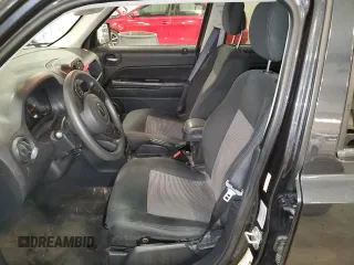 2014 Jeep Patriot Sport with VIN 1C4NJPBA3ED925535, listed as a Copart auction lot 61402245 with 98,582 mi miles and Salvage title. Bid and sale history available at DreamBid. Image 7.