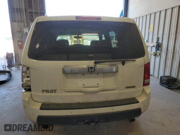 2010 Honda Pilot Touring with VIN 5FNYF3H8XAB019977, listed as a Copart auction lot 75955974 with 136,873 mi miles and Salvage Title. Bid and sale history available at DreamBid. Image 6.