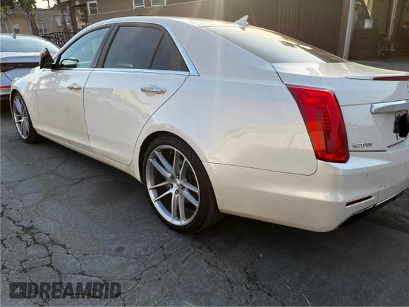 2014 Cadillac CTS Vsport Premium RWD z VIN 1G6AV5S87E0163180, wystawiony jako Copart lot #88171835 z przebiegiem 156 789 mil mil oraz Szkoda całkowita • Salvage title. Historia ofert i sprzedaży dostępna na DreamBid. Obrazek 3.