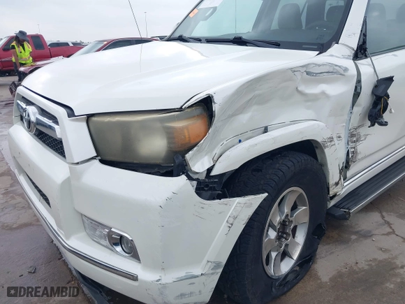 2011 Toyota 4Runner SR5 with VIN JTEZU5JR7B5014100, listed as a IAAI auction lot 41769637 with 215,474 mi miles. Bid and sale history available at carsss.com. Image 6.